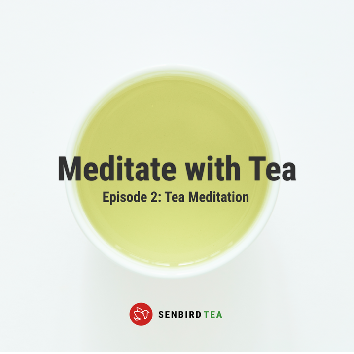 brewed tea in a white cup with Meditate with Tea text written on it