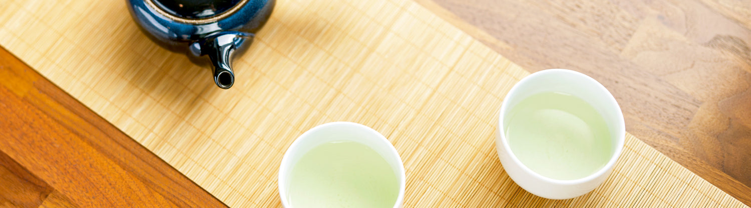 Desktop Senbird tea collection with tins and cups for Japanese tea