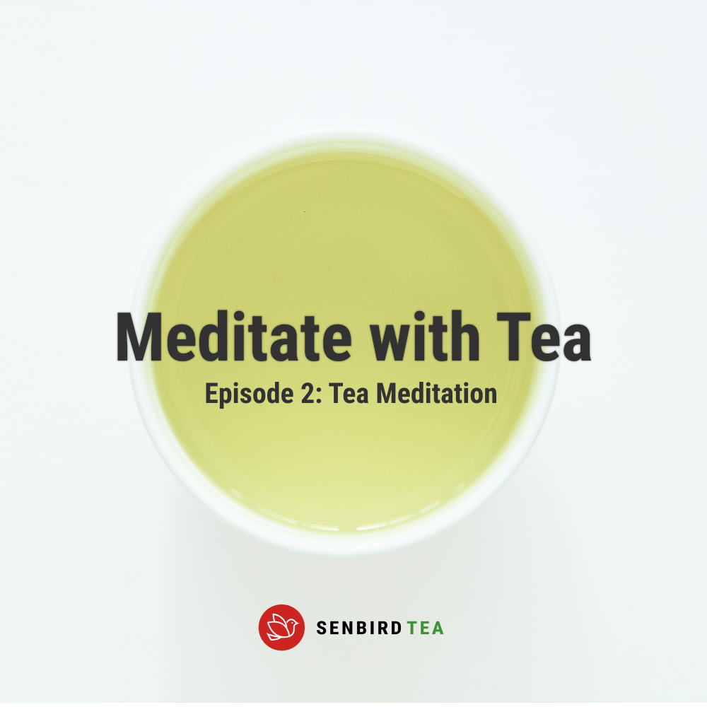 brewed tea in a white cup with Meditate with Tea text written on it