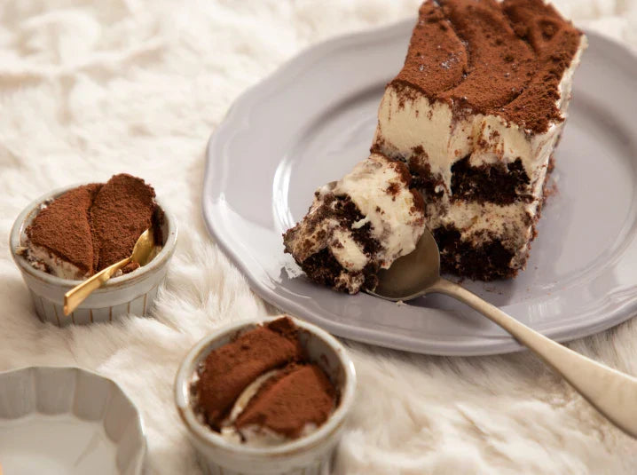 Hojicha Tiramisu on a plate, and in two small ramekins