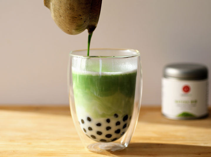 pouring bubble hojicha in a glass