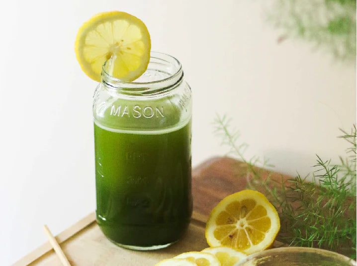 Matcha Lemonade in a jar with lemon slice on the top