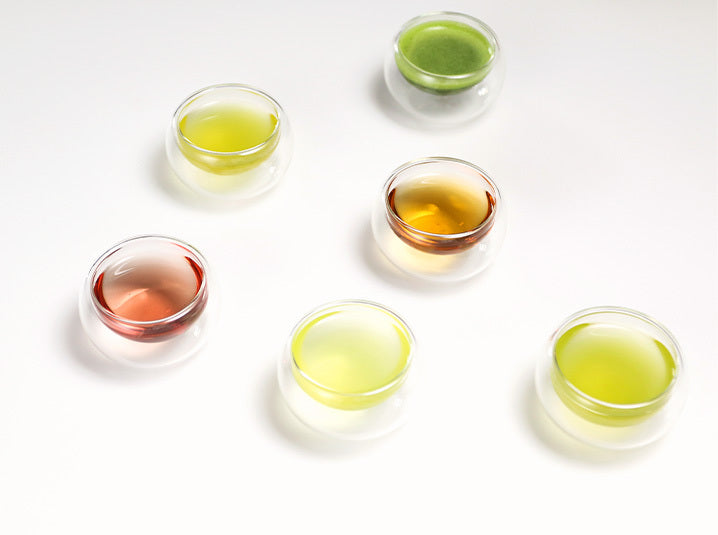 Different brewed tea in glass cups