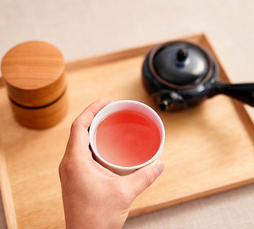 Kuromamecha Japanese herbal tea rosy cup with kyusu teapot and wood canisters