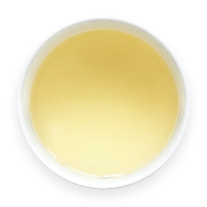 Golden Japanese tea shogacha ginger herbal tea brewed in white cup