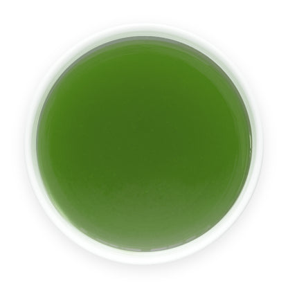 Prepared Aojiru Japanese green juice in a white cup viewed from above