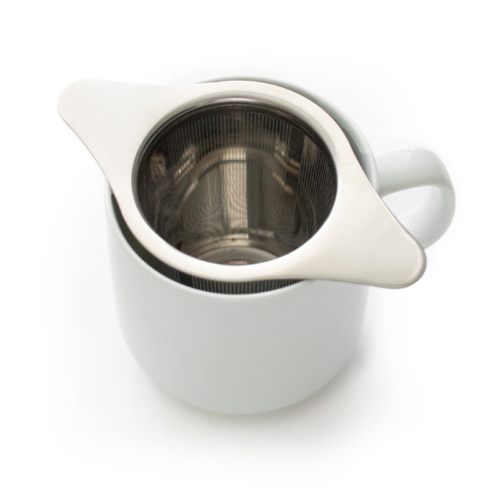 stainless_steel_tea_infuser_in_white_cup_spacious_mess_free_loose_leaf_tea_brewing